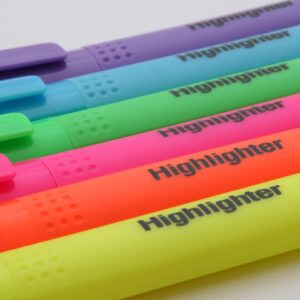 Flourescent pens in a row